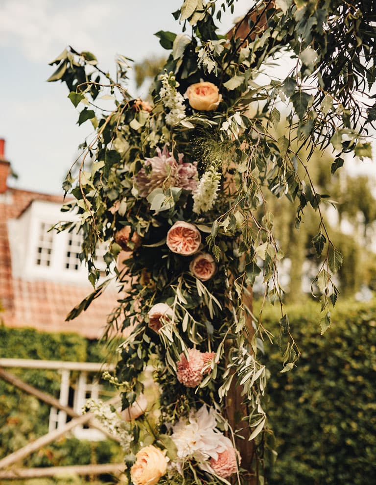 wedding flower arch in backyard garden