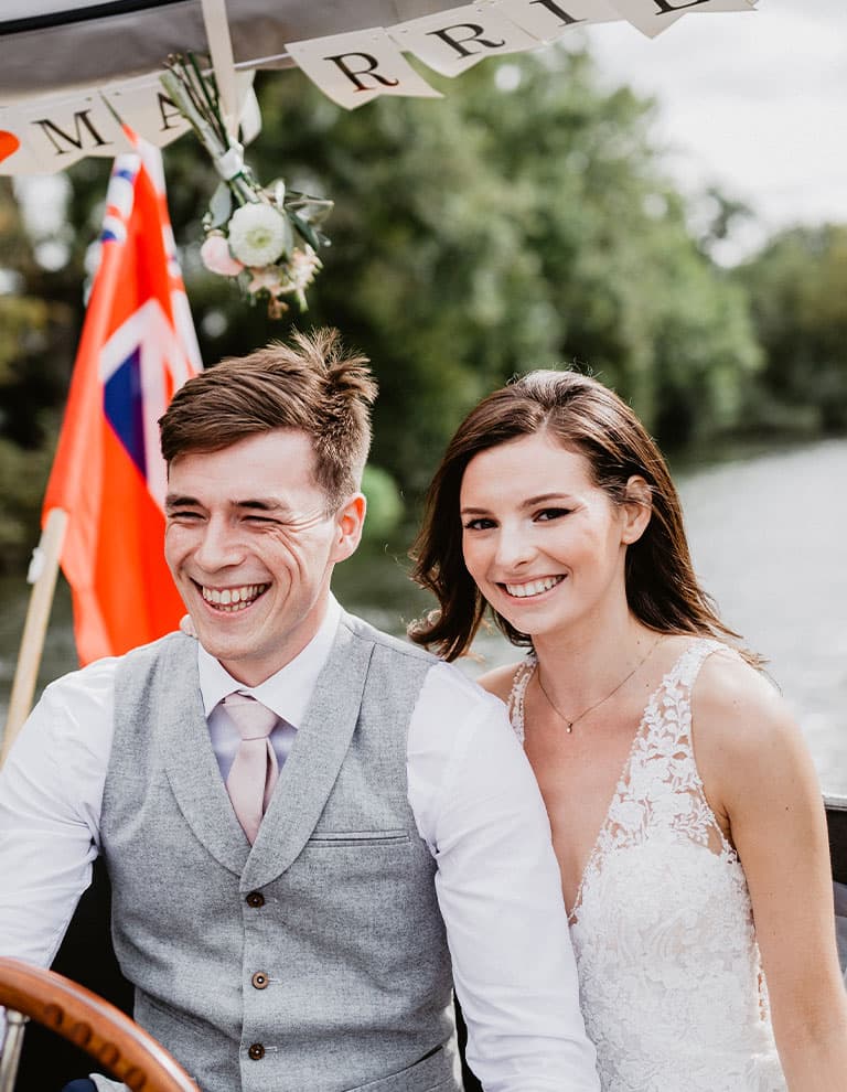 bride and groom at their intimate boat wedding