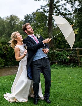 wedding couple funny pic with umbrella