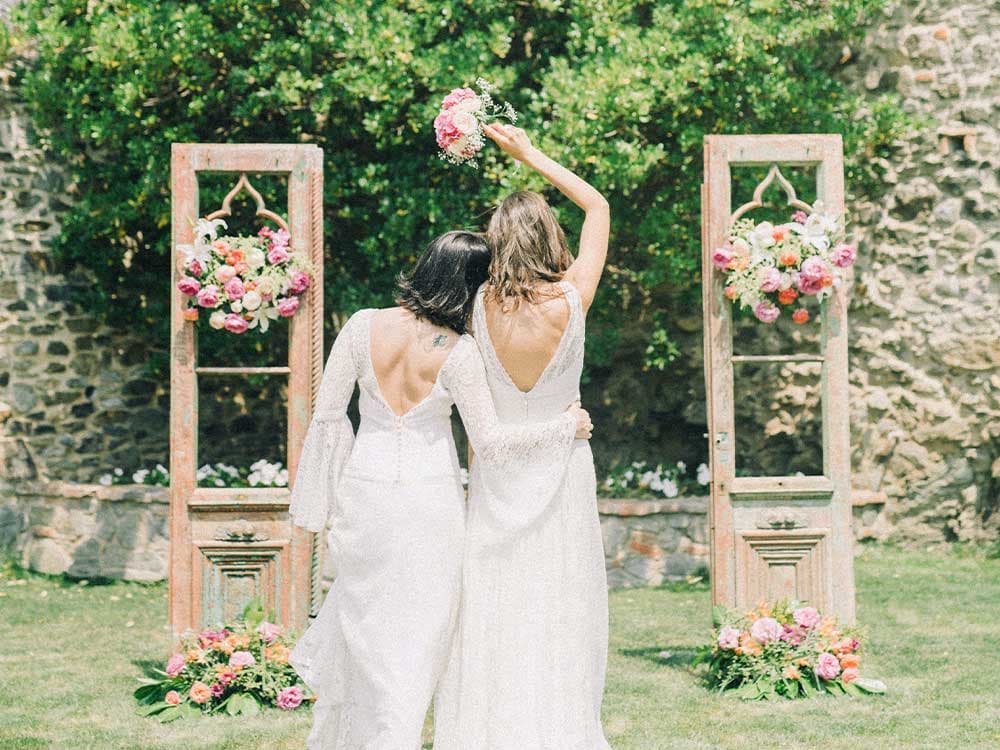 brides celebrate with floral bouquets
