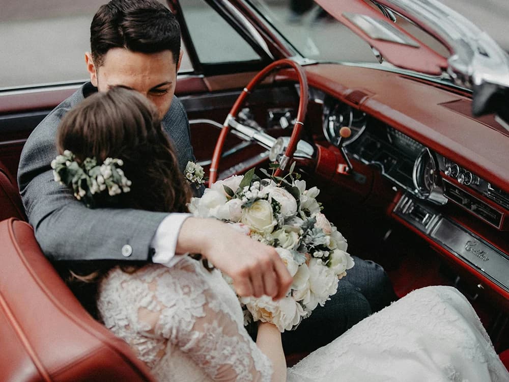 just married in  wedding car