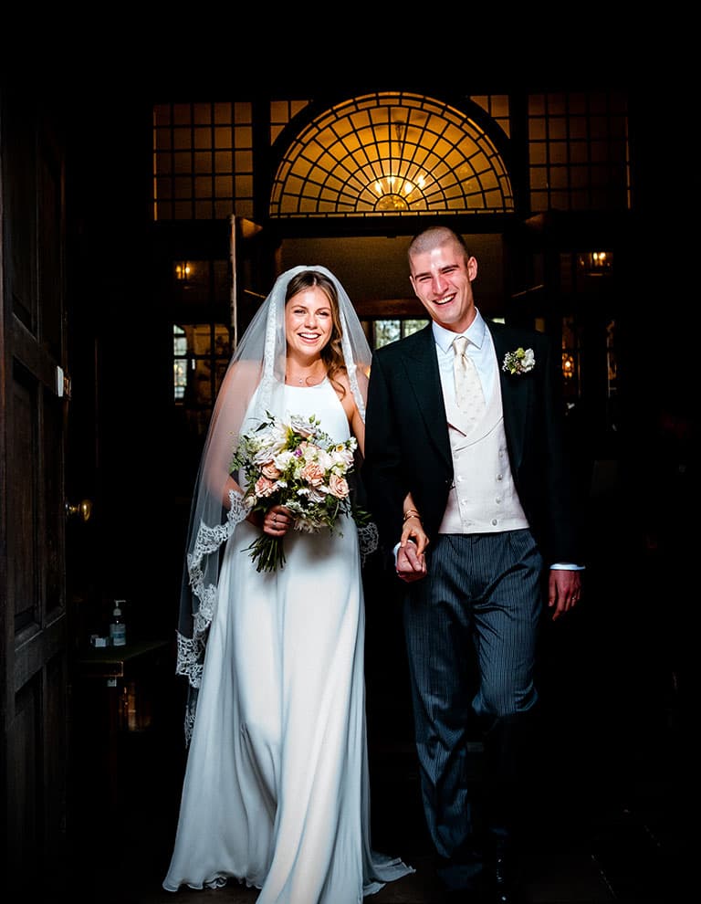 real sentimental wedding inspiration couple walk out hand in hand