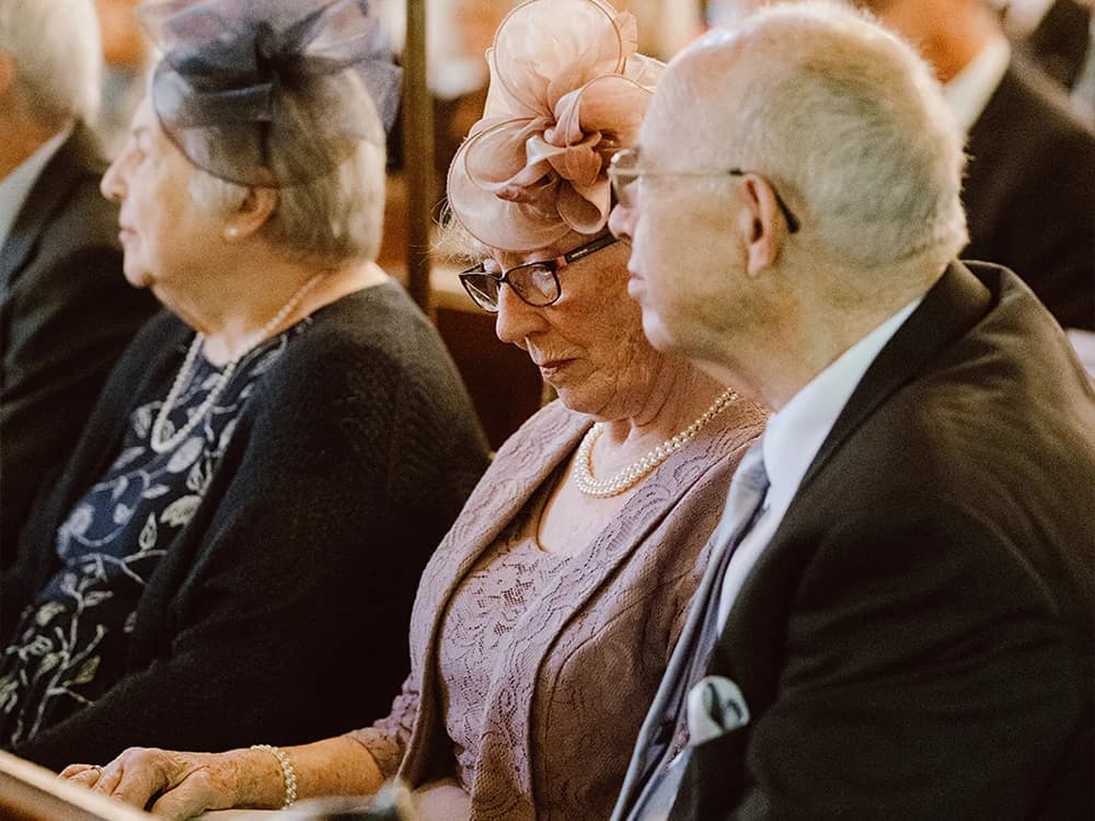 Grandparents of the engaged couple during wedding ceremony