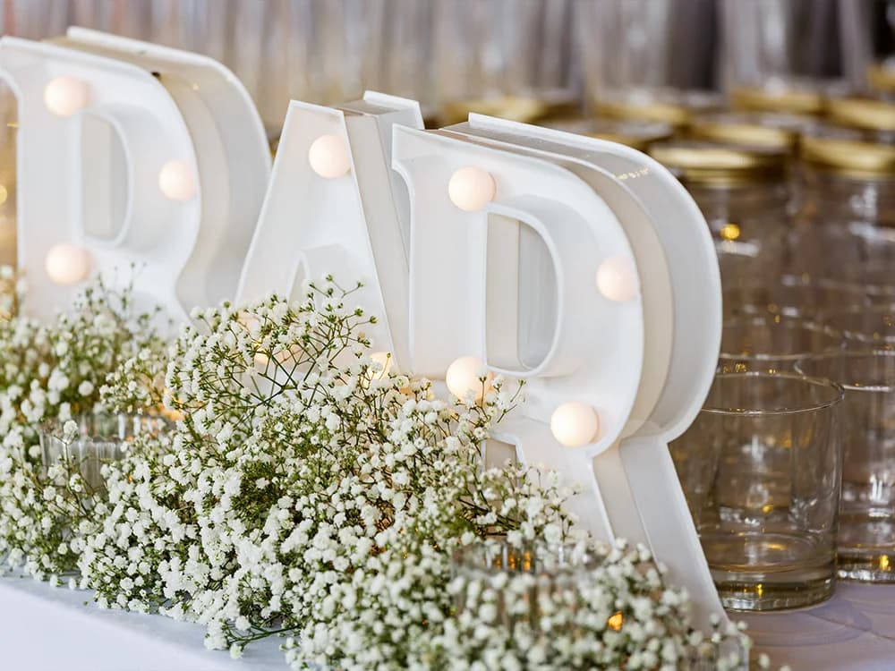 wedding bar sign with flowers