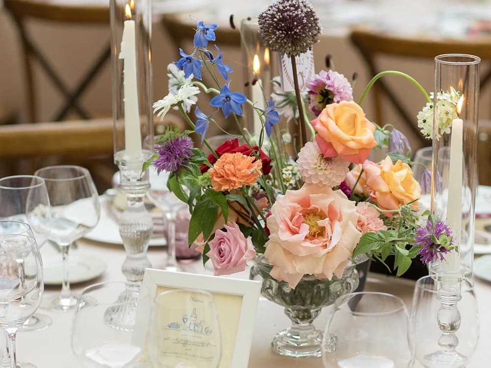 Colourful wedding table flower centerpiece