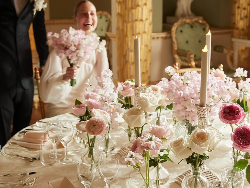 bride and groom with wedding flower décor