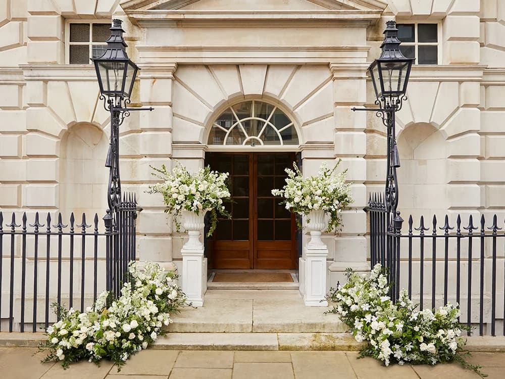 wedding ceremony flowers outside wedding venue