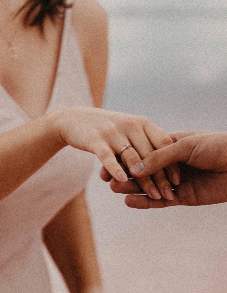 Engagement ring and romantic beach proposal