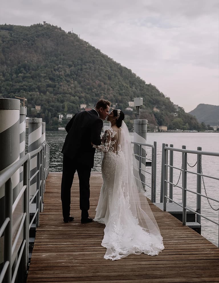 Lake Como pier, bride and groom