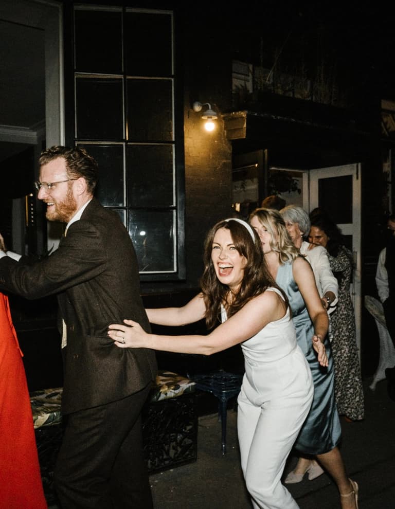 Annabel dances with wedding guests