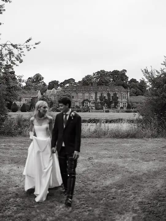 Bride and groom outside Brympton house wedidng venue