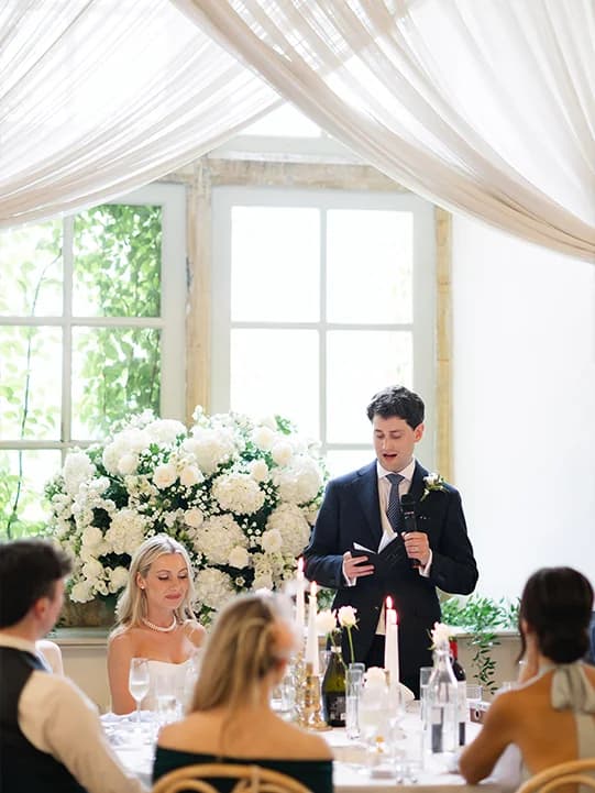 Groom gives speech during wedding breakfast