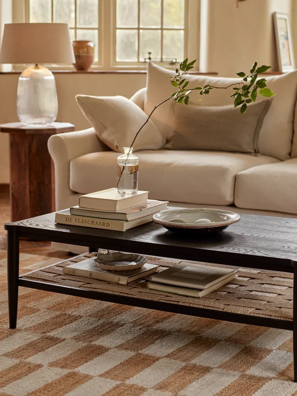 A cosy living room featuring a sofa and coffee table from Neptune