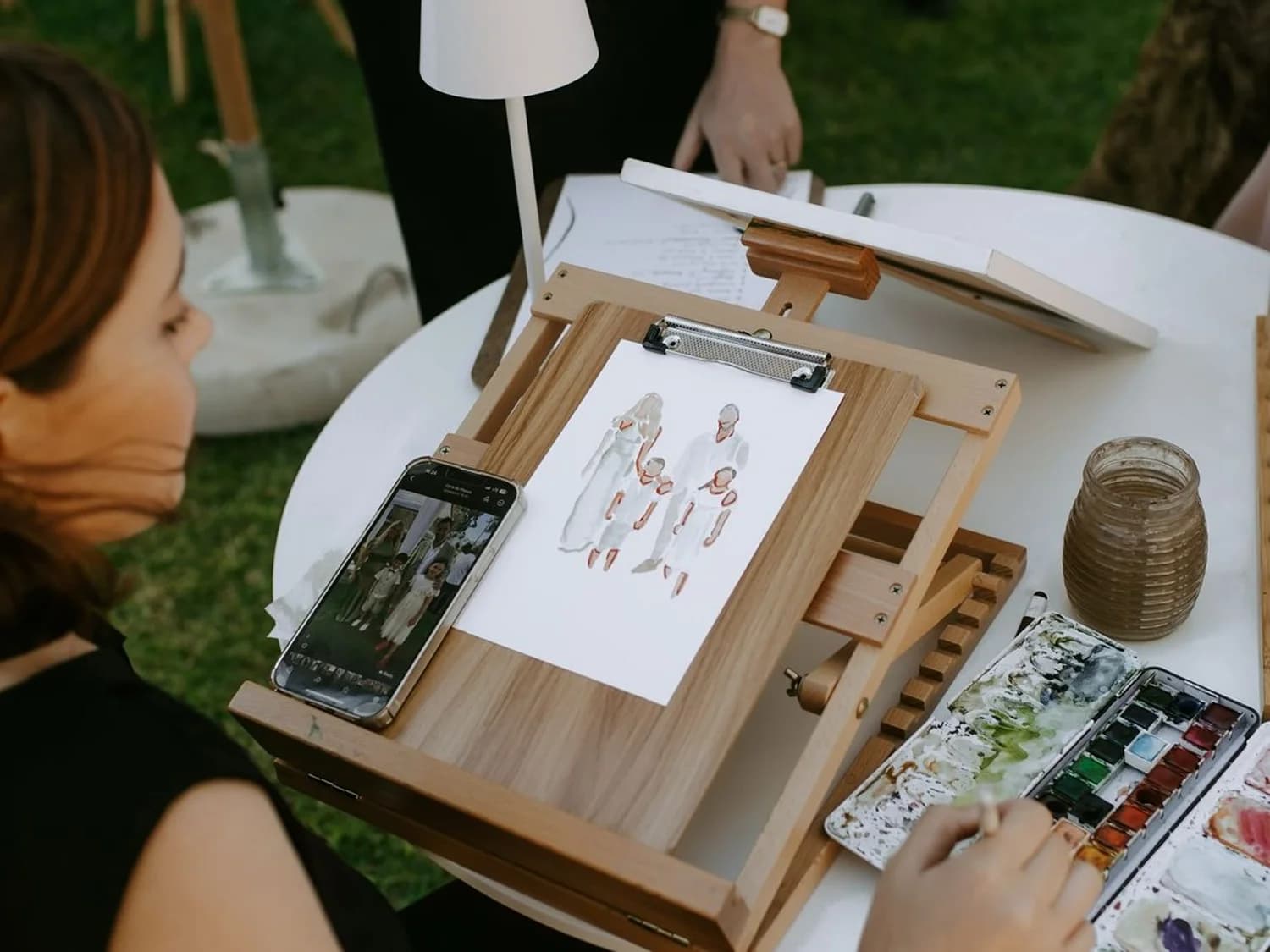 A live painting of wedding guests at the wedding