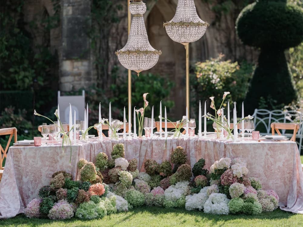 Statement floral installation placed in front of the wedding table