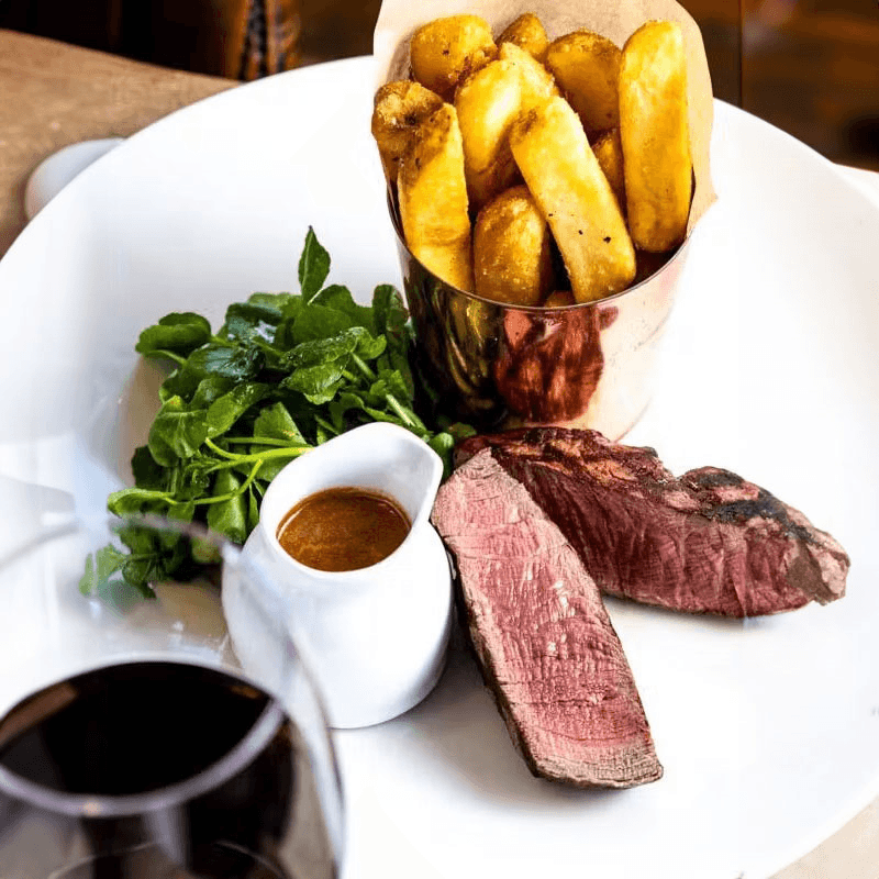 Theatre Tickets to The Lion King with Steak and a Bottle of Wine at Bonds Mayfair for Two