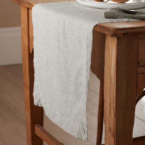 Image showing the Sid Stripe Table Runner, Olive product.