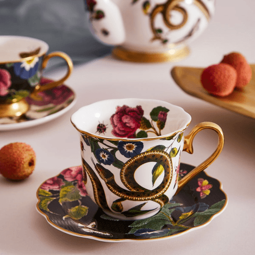 Image showing the Creatures of Curiosity Fluted Tea Cup & Saucer, Black product.
