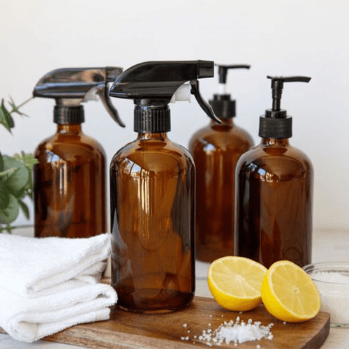 Image showing the Living Nostalgia Amber Glass Reusable Spray Bottle Set product.